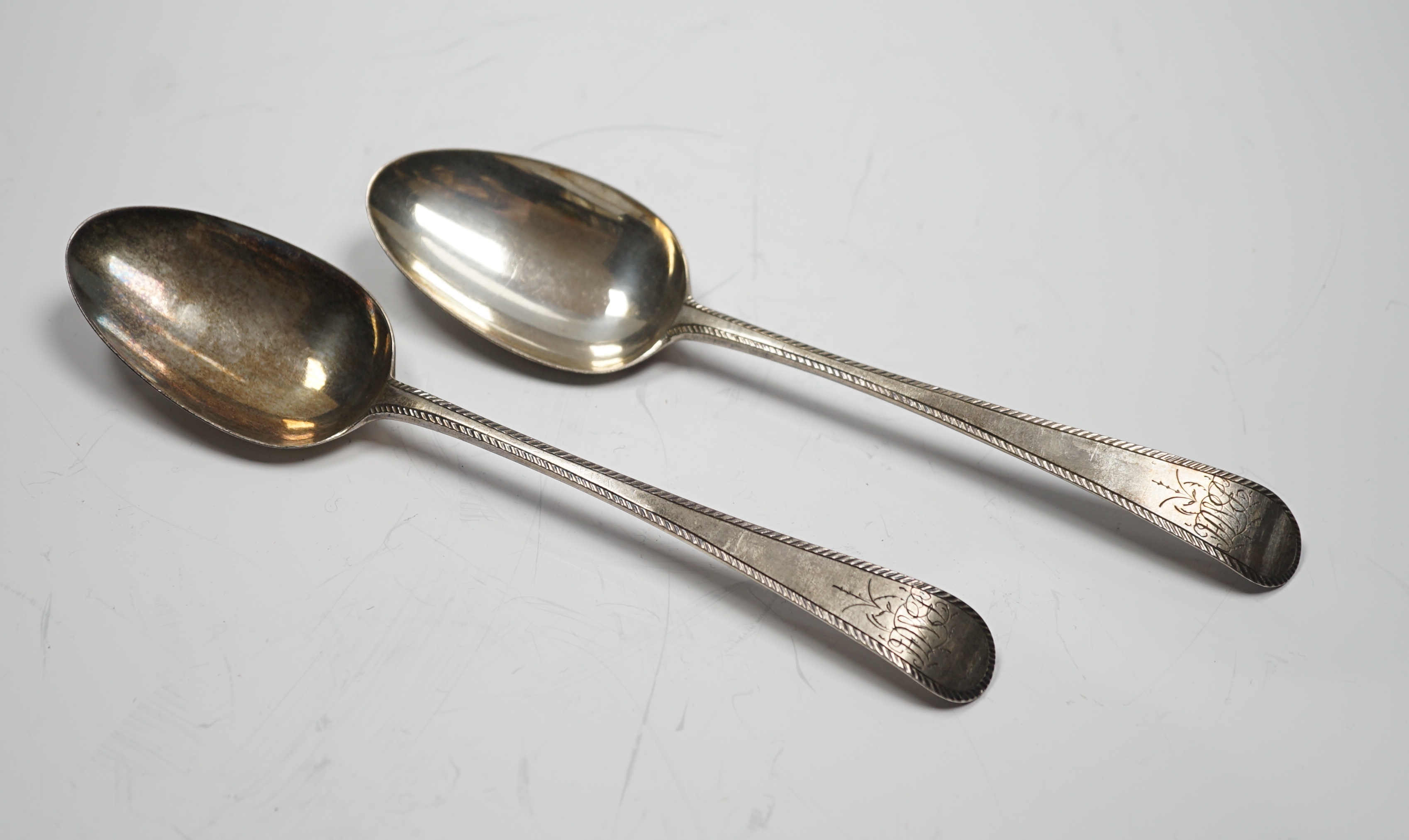 A pair of George III silver feather edge Old English pattern table spoons, by Hester Bateman, London, 1778, 21.4cm, 4oz.